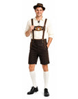 a man wearing a Bavarian style lederhosen costume in brown for Oktoberfest.