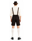 the back view of a man wearing a Bavarian style lederhosen costume in brown for Oktoberfest.