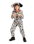 A child modeling a Dalmatian dog costume jumpsuit with black-and-white spotted pattern, floppy dog ears on the hood, and a red collar with a gold bell, photographed against a plain white background.
