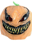 A scary, monstrous jack-o'-lantern pumpkin latex mask with a wide, toothy grin, blackened details, and a small green stem on a plain white background.
