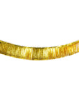 Gold fringe trim on a white background