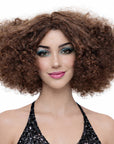 Woman with voluminous brown afro wig on a white background