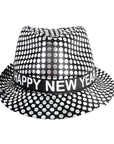 A black and silver polka dot fedora hat with a black band around the crown that reads 'HAPPY NEW YEAR' in white capital letters, shown on a plain white background.
