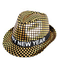 A black and gold dots metallic fedora hat with a black band around the crown that reads 'HAPPY NEW YEAR' in white letters, shown on a plain white background.