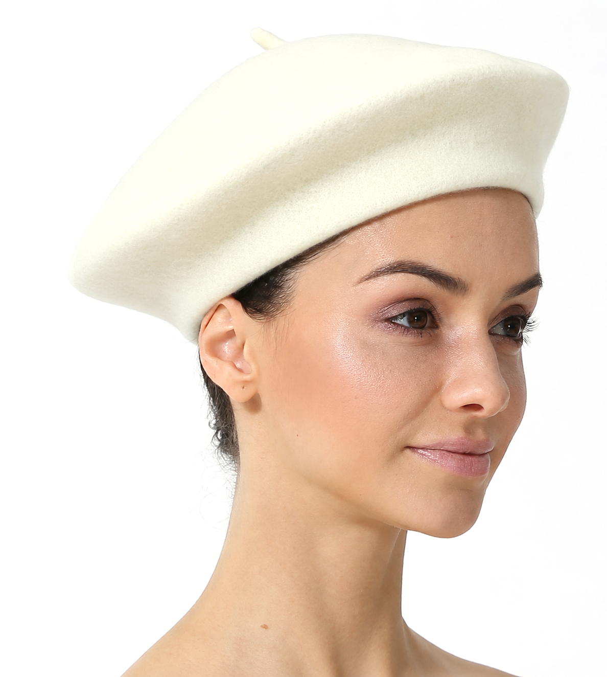 Woman wearing a white beret against a white background