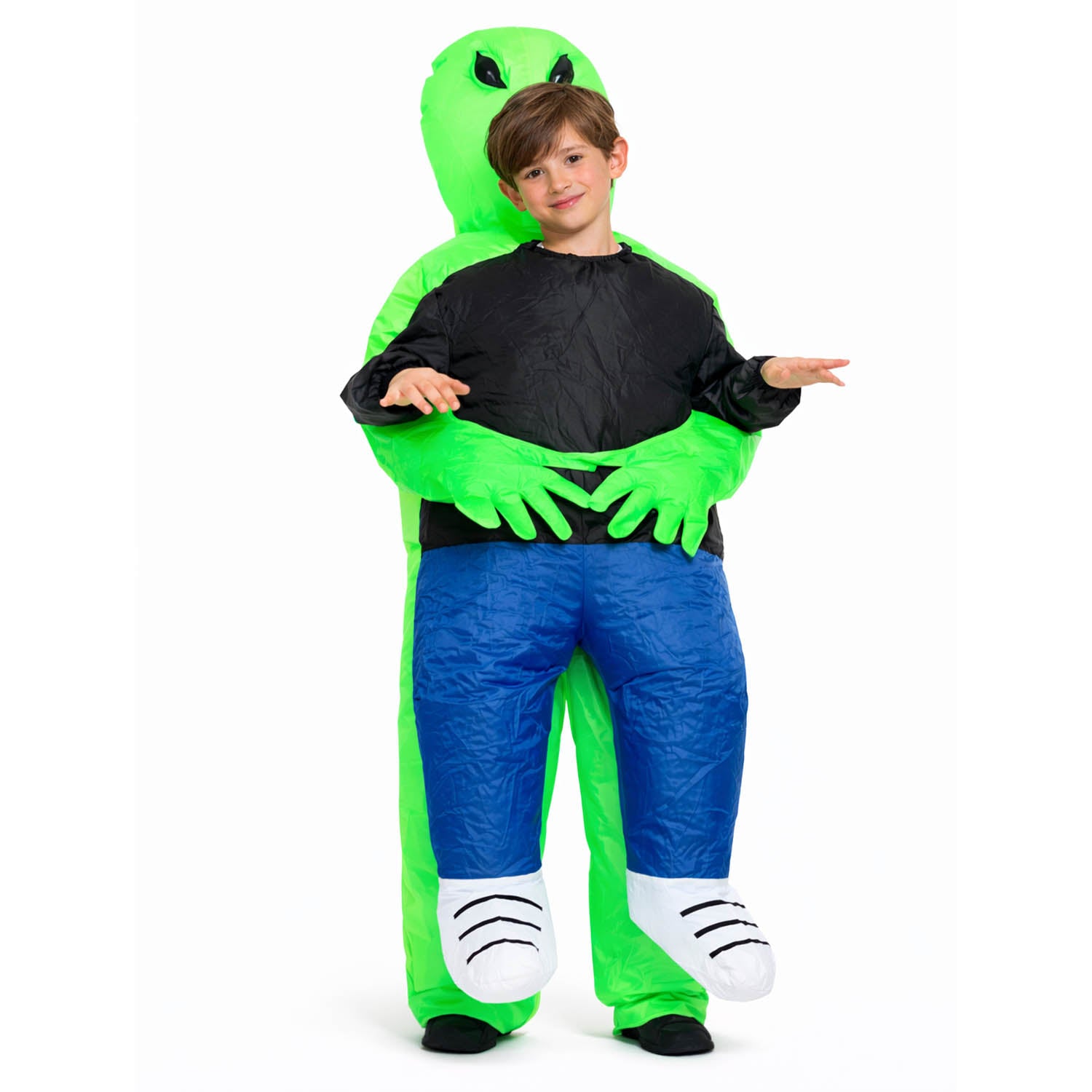 Child wearing a green and blue inflatable alien costume on a white background