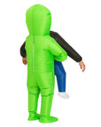 Person wearing a bright green alien costume on a white background