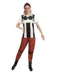 Person wearing a black and white striped shirt with star patterns and red plaid pants on a white background