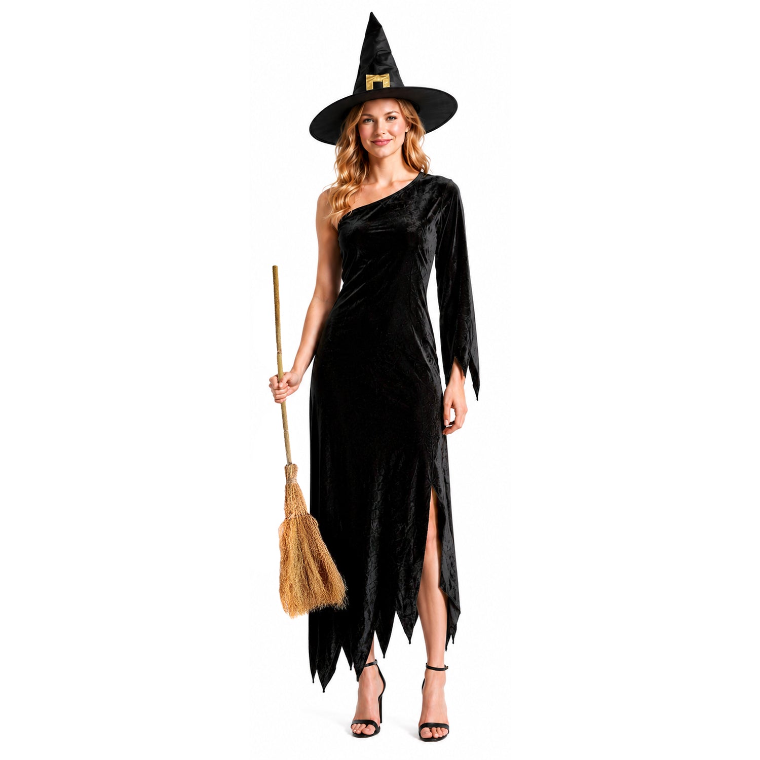 a woman wearing a black, one shoulder witch dress and witch hat, holding a witch broom. 