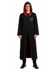 Person wearing a black robe with red trim on a white background