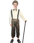 Child in a vintage costume with suspenders, bow tie, and cane on a white background