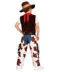 Child wearing a cowboy costume with a vest, hat, and patterned pants on a white background