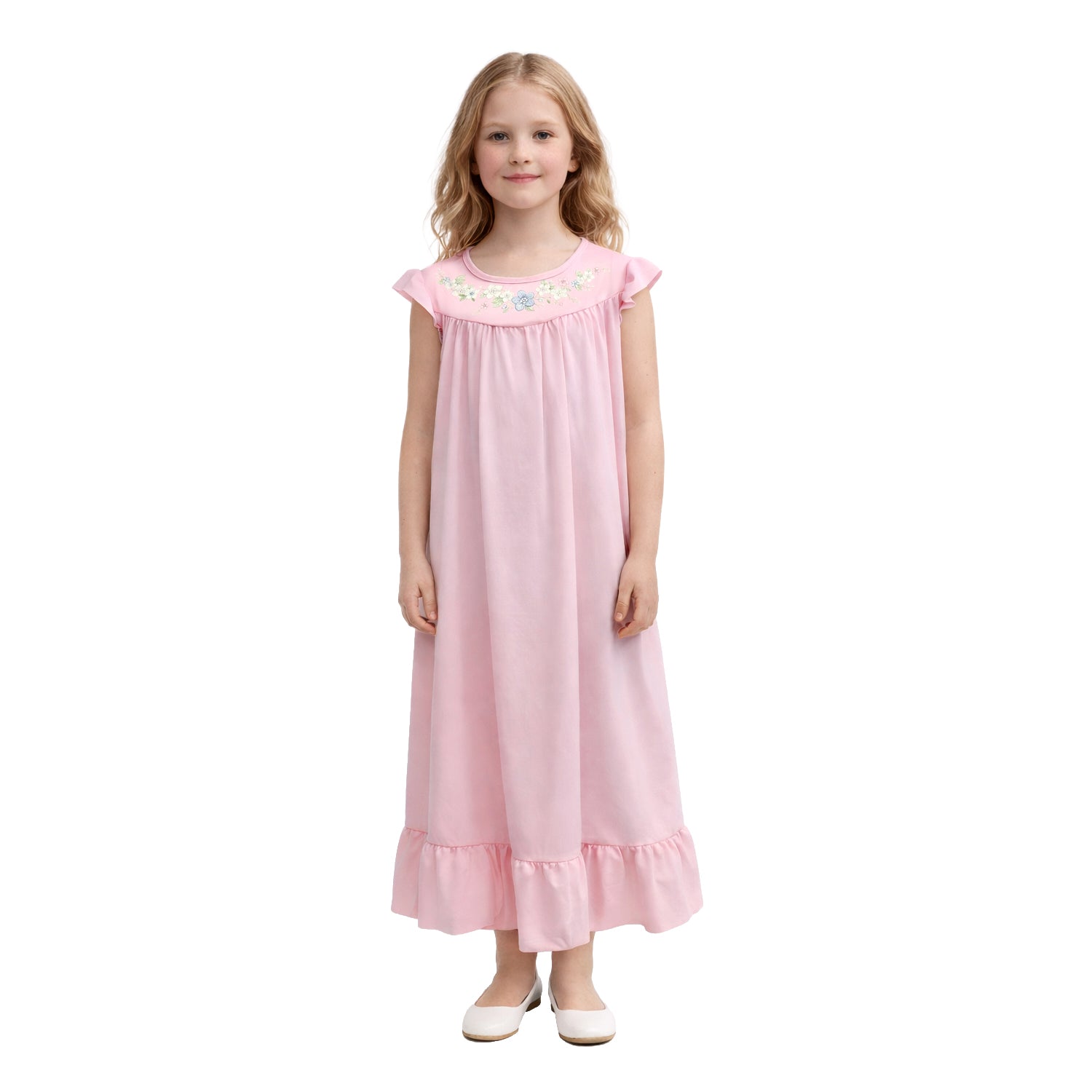Young girl wearing a pink nightgown with floral embroidery on a white background