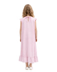 Pink dress with ruffled hem on a white background