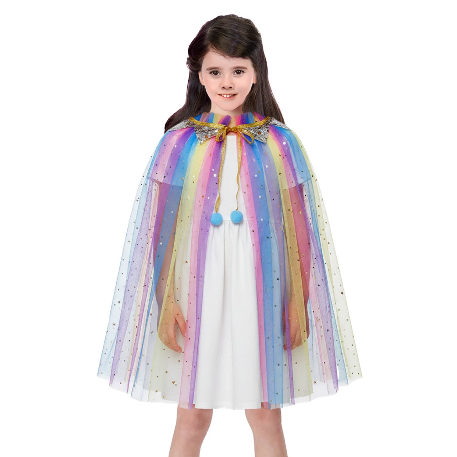 Young girl wearing a colorful rainbow cape over a white dress on a white background