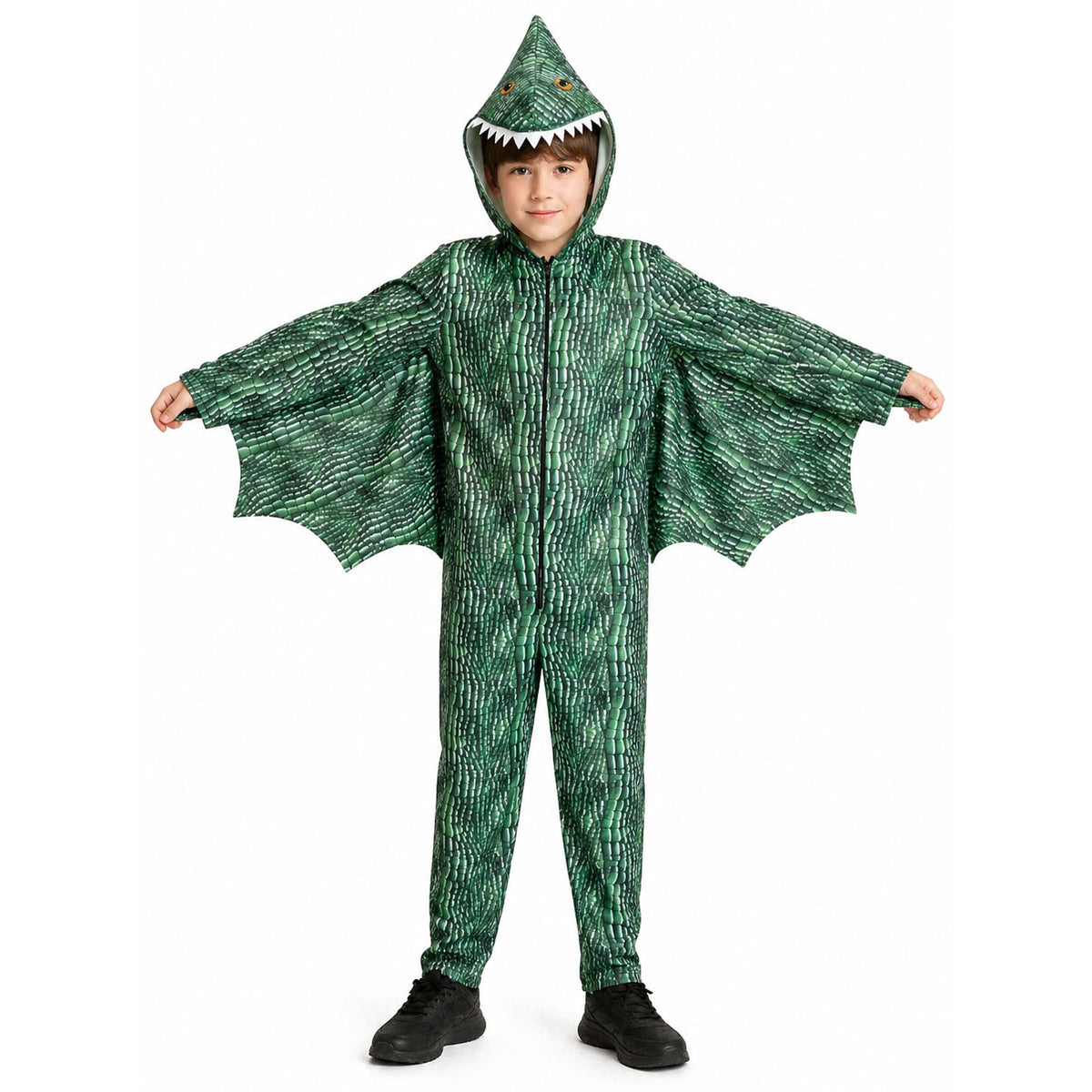 A child wearing a green dinosaur costume with textured scales, a hood with a shark-toothed mouth, and attached wing-like sleeves, standing against a plain white background.