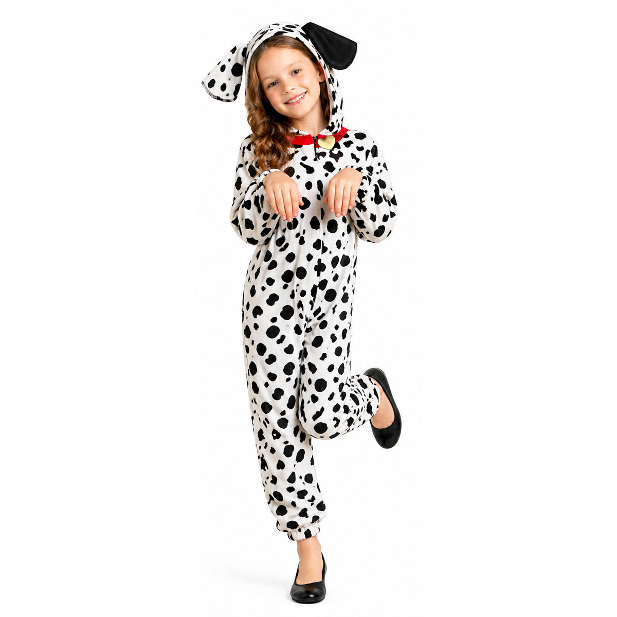 A young girl modeling a black and white Dalmatian print hooded onesie costume with black dog ears and a red collar detail, set against a plain white background.