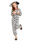 A young girl modeling a black and white Dalmatian print hooded onesie costume with black dog ears and a red collar detail, set against a plain white background.