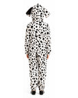 A child viewed from the back wearing a Dalmatian-print hooded one-piece costume with floppy dog ears, shown against a plain white studio background.