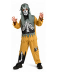 A child modeling a skeleton-themed costume consisting of a hooded mask with a skull face, a black vest with white skeleton print, a yellow jumpsuit with black side panels and white skeleton graphics on the legs, and black shoes, photographed against a plain white background.