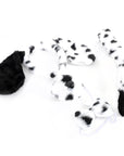A plush animal tail costume accessory with a black-and-white spotted pattern, featuring a black furry tail, black and white furry ears, and dog nose and bow tie.