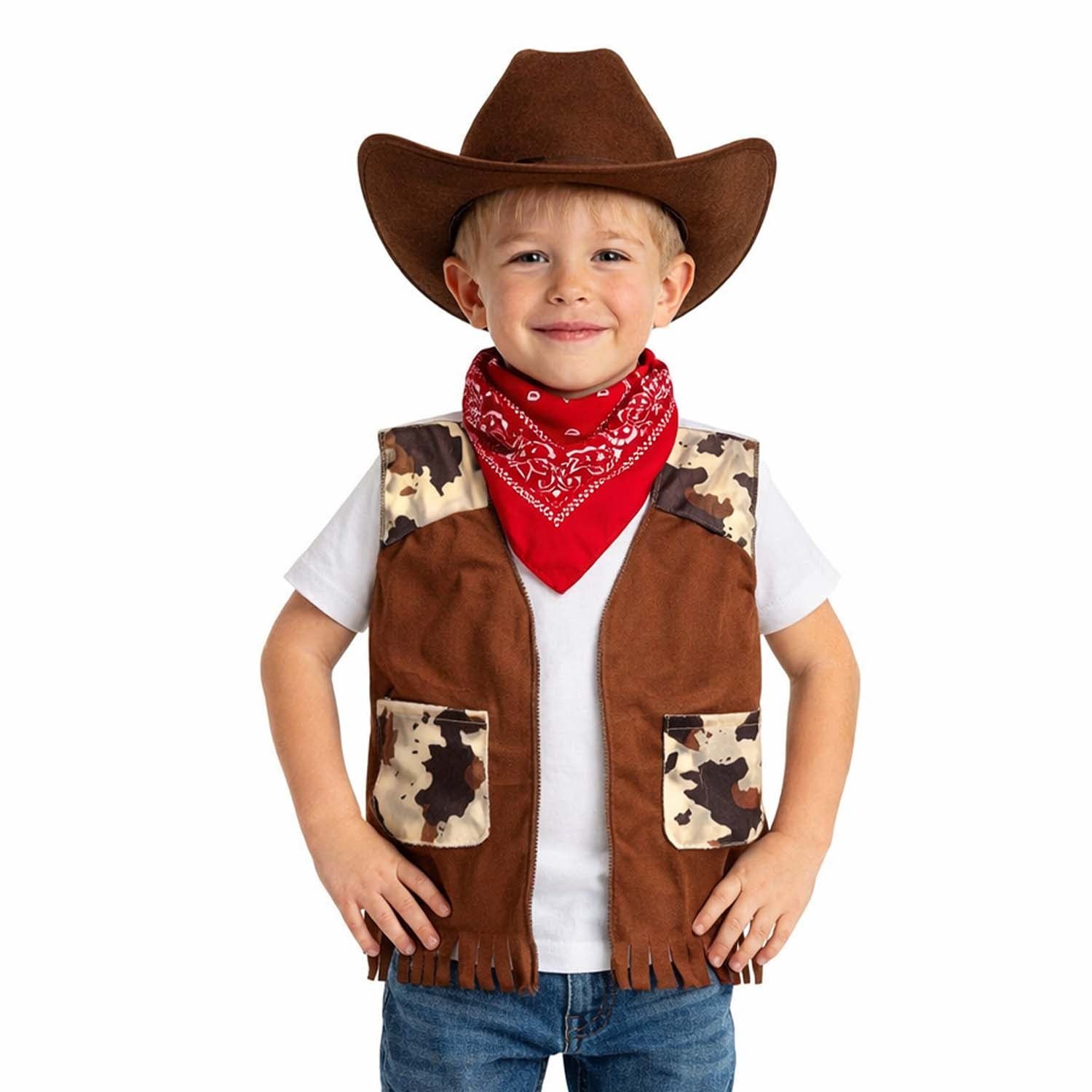 A young boy modeling a brown faux-suede cowboy costume vest with camouflage-patterned patches, a matching brown cowboy hat, and a red bandana, worn over a white t-shirt and blue jeans against a white background.