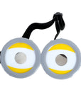 A pair of novelty costume goggles designed to look like cartoon eyes, featuring gray outer rims, white centers, yellow curved stripes, and a black adjustable strap, shown on a plain white background.