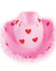 A pink cowboy hat with red glitter hearts and a fluffy pink feather trim, isolated on a white background.