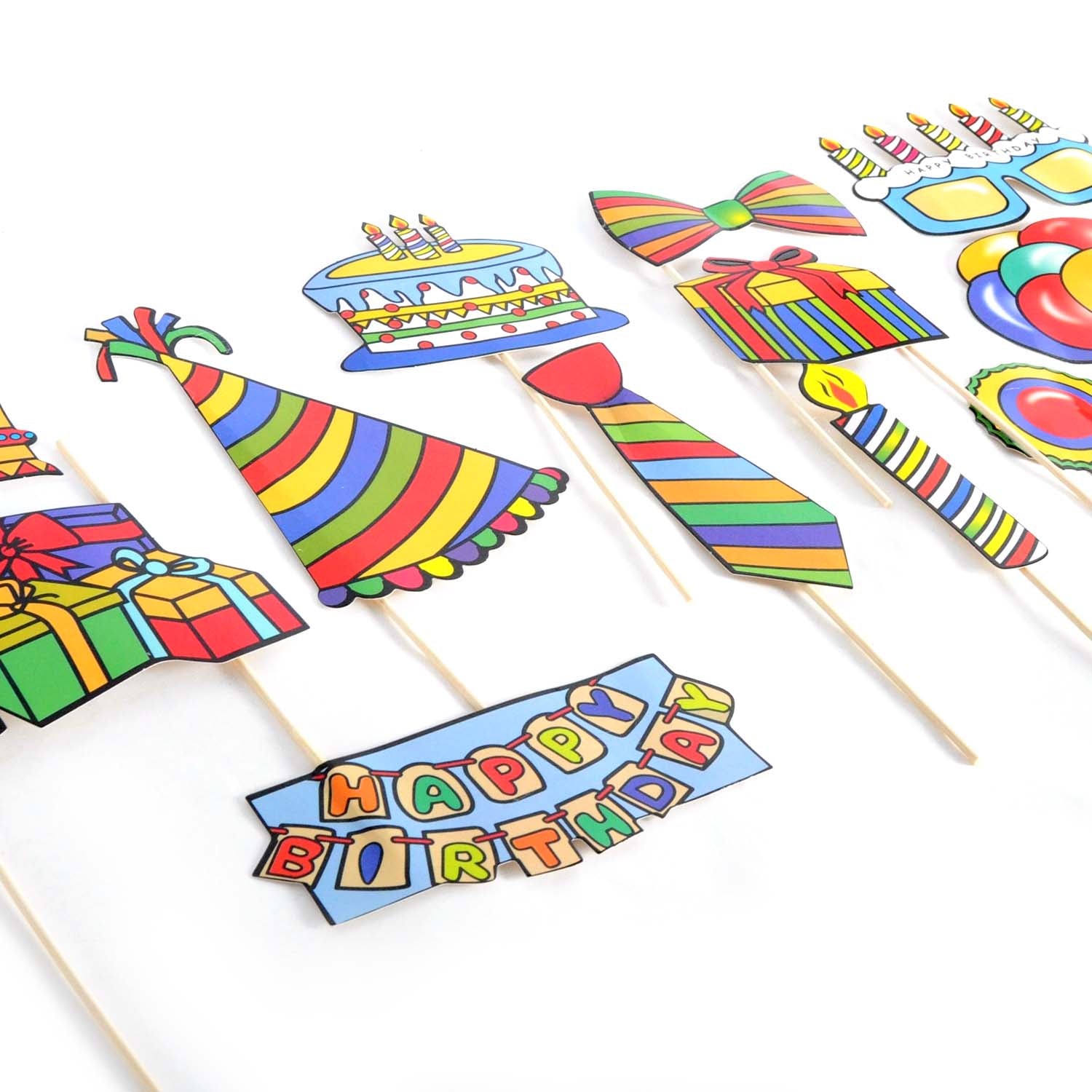 A set of colorful birthday photo booth props on wooden sticks, including a 'HAPPY BIRTHDAY' banner, party hats, striped ties, balloons, candles, gifts, and a cake, arranged on a white background.