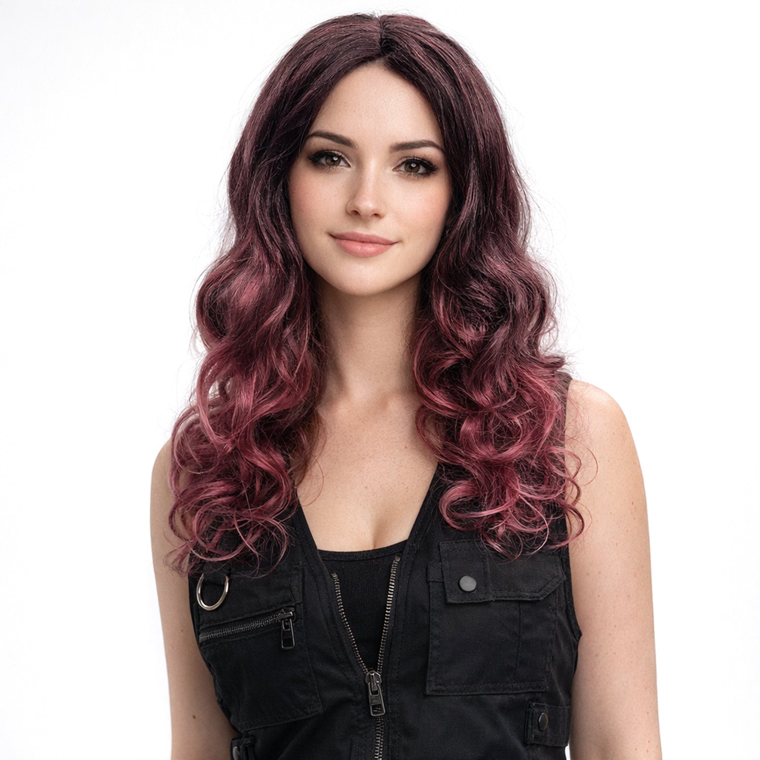 Woman with long, wavy, purple hair wearing a black sleeveless top on a white background