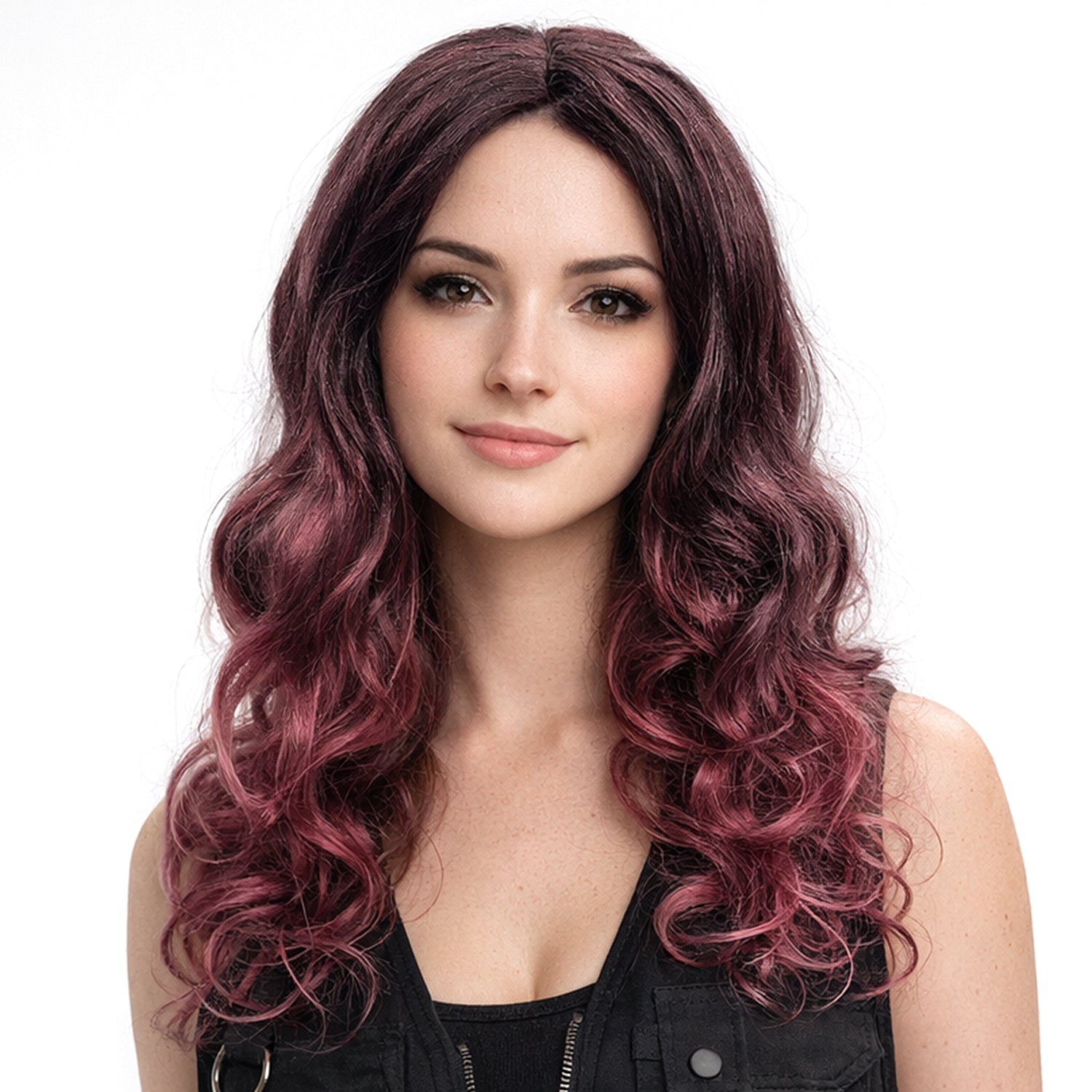 Woman with long, wavy, purple hair wearing a black sleeveless top on a white background