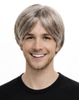 Person wearing a gray wig on a white background