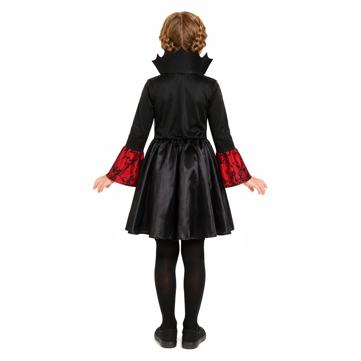 A child model shown from the back wearing a black vampire costume dress with red patterned cuffs, black tights, and black shoes against a plain white background.