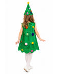 A child viewed from behind wearing a green Christmas tree costume with colorful felt ornaments and a matching pointed hat topped with a yellow star, on a plain white background.