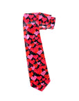 A necktie with a repeating pattern of red, pink, and light pink hearts on a black background, isolated on a white studio background.
