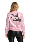 Person wearing a pink jacket with 'Pink Lady' text on the back, standing against a white background