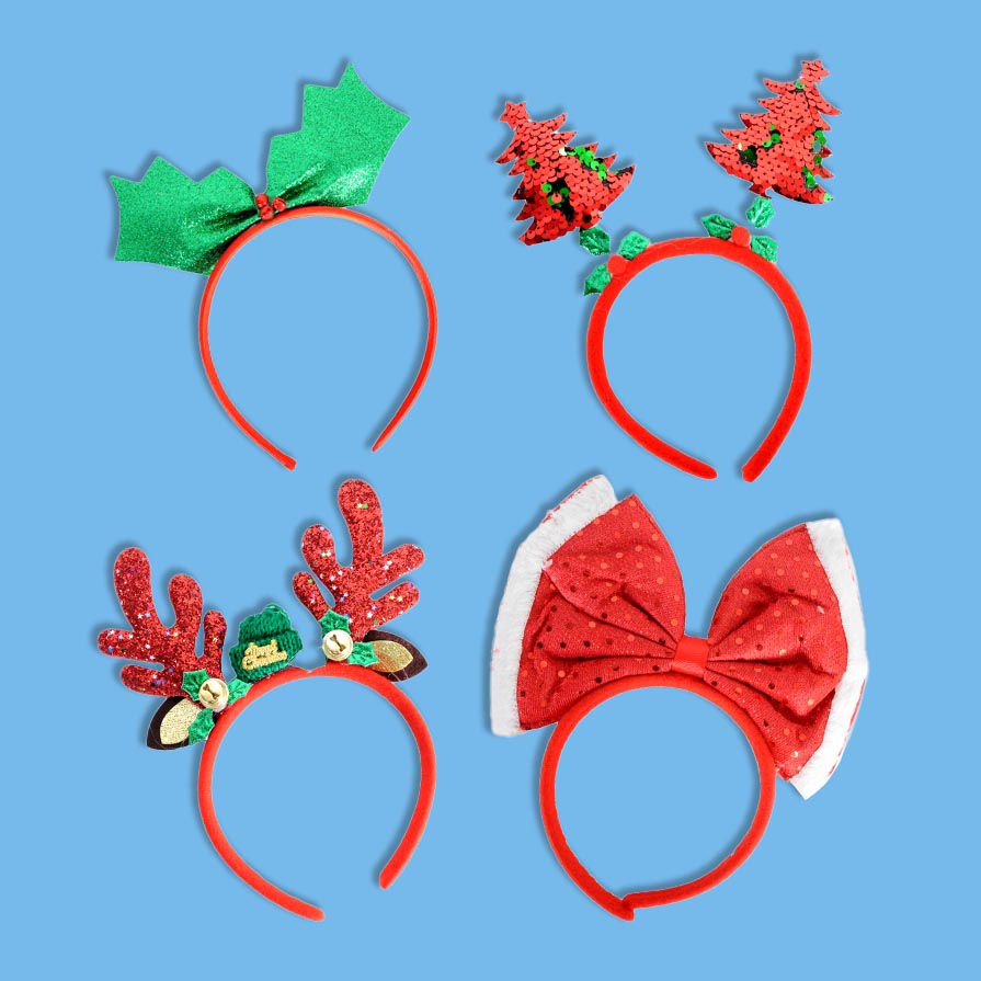 Set of festive headbands with red and green decorations on a blue background